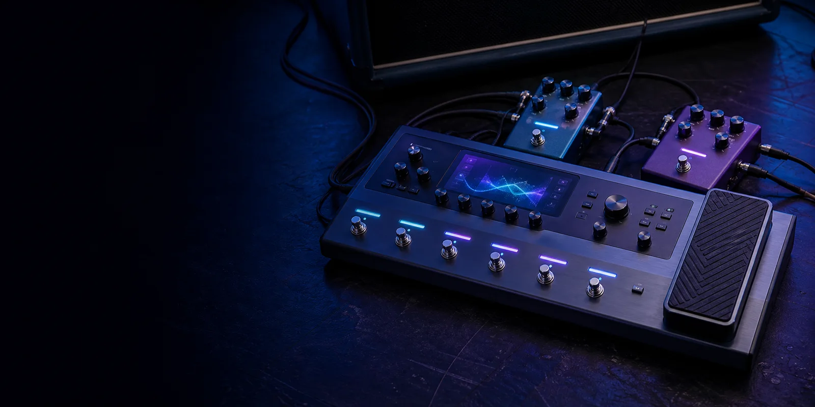 A multi-effects processor and two pedals arranged as a complete guitar rig